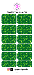 St Patricks Day green nail decals with tiny shamrock pattern on a white background, featuring Glossy Nails branding.